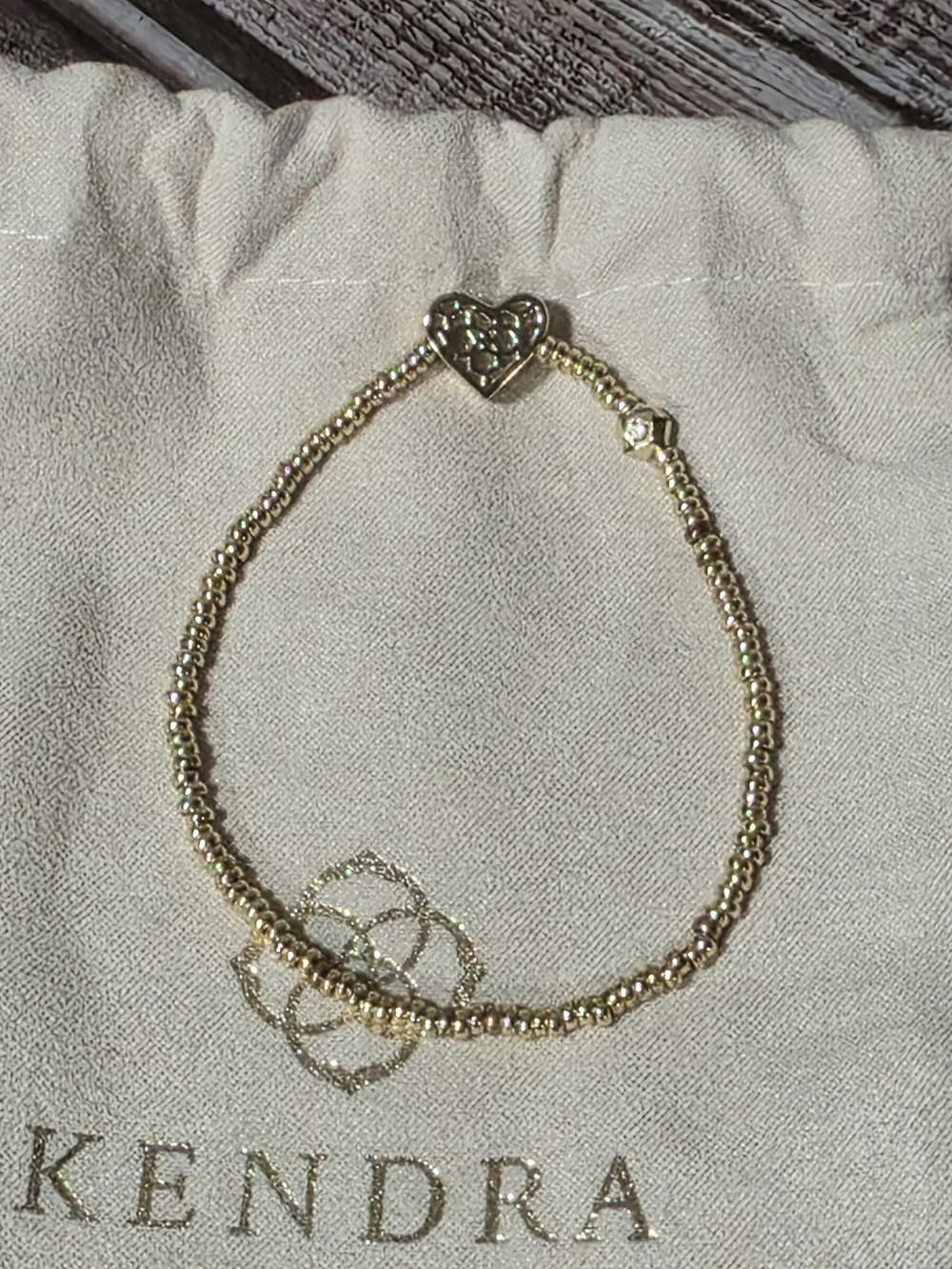 Kendra Scott Gold Ari Stretch Bracelet With Ivory Mother of Pearl Heart Accent - Picture 4 of 7